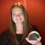 Ellie Owen with her award